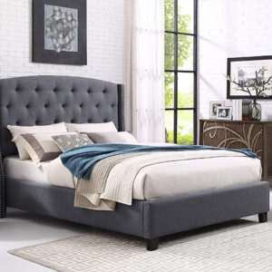Gray tufted upholstered bed frame with tall button-tufted headboard and nailhead trim in contemporary bedroom
