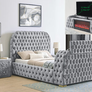 Gray tufted upholstered bed frame with built-in fireplace and hidden TV lift system