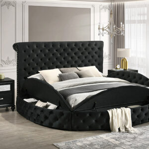 Black tufted upholstered bed frame with lift-up storage base in luxury bedroom setting