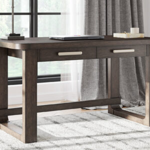 Modern wood writing desk with drawers in a contemporary home office